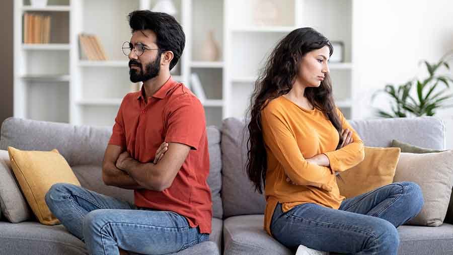 A couple sitting angry with each other